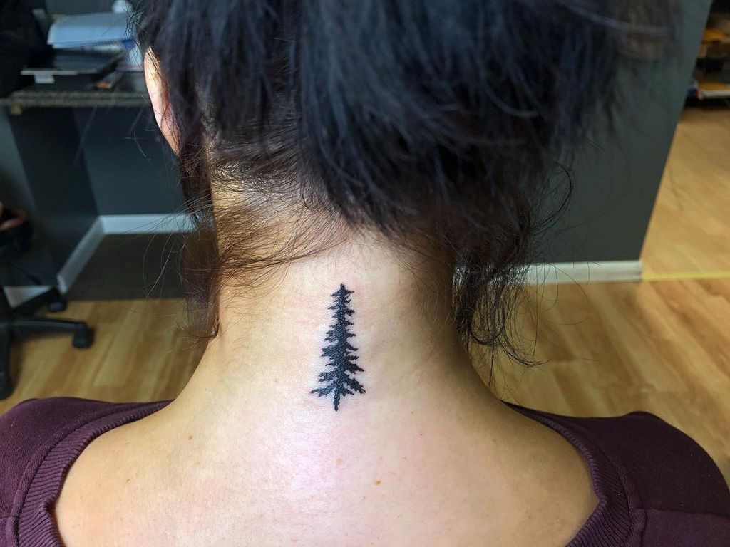 Pine tree tattoo by Kristy remembering childhood memories w Click A Tree